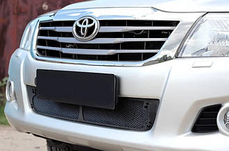 Захисна сітка переднього бампера Toyota Hilux 2011-2015 г. Тойота Хайлюкс