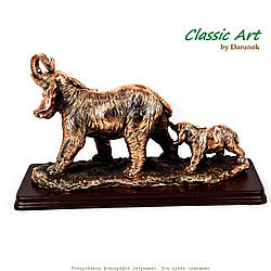 Фігурки слонів, що йдуть одна за одною ES160