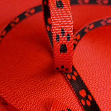 Стрічка ремінна 10 мм "лапки" червоні 50 м