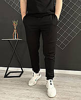 Демисезонные базовые однотонные спортивные штаны черного цвета / мужские черные штаны на весну