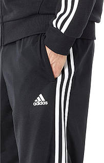 Adidas essentials tracksuit sale