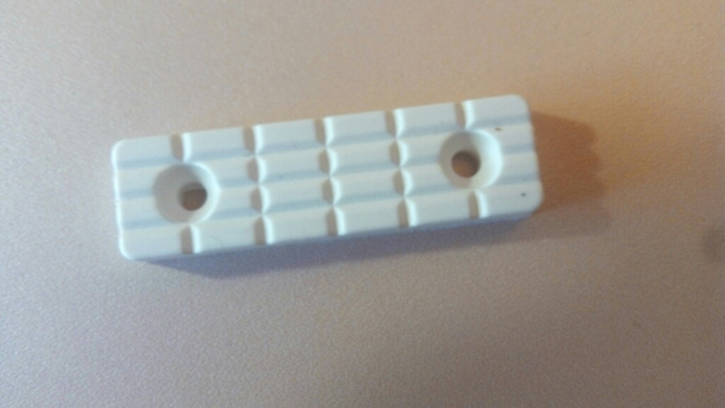 Ніжка меблева під саморіз біла