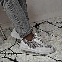 Шкіряні кросівки жіночі