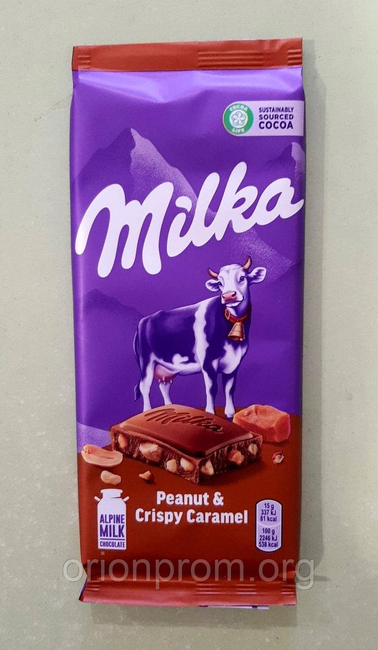 Шоколад Milka з арахісом і карамеллю молочний 90 г (24.01.2025)