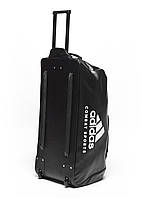 Дорожная сумка на колесах с белым логотипом Combat Sports | черная | ADIDAS ADIACC056CS
