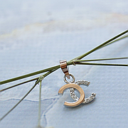 Срібна підвіска із золотими вставками та фіанітами