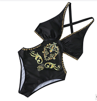 Жіночий суцільний купальник чорного кольору з орнаментом