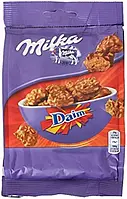 Цукерки Milka Карамель Daim 145г