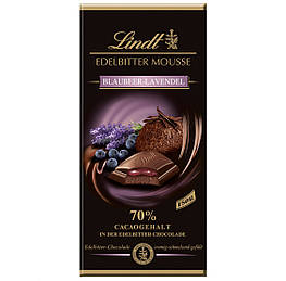 Lindt Чорний шоколад 70% какао з шоколалним мусом, чорницею і лавандою  150g
