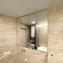 Монтаж дзеркала на стіну у ванній