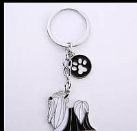 Брелок на ключі метал собака пес порода біла з чорним болонка коло — лапка