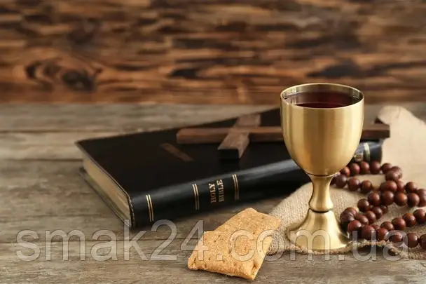 stock_photo_chalice_wine_bread_beads_cross.webp