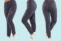 Женские прямые демисезонные трикотажные брюки со стразами 44