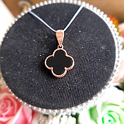 Срібна підвіска Квітка з позолотою та чорним оніксом