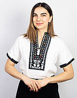 Жіноча вишиванка лляна біла "Леви" з ручною вишивкою на короткий рукав