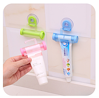 Тримач-витискач дозатор прес для зубної пасти, крему пластиковий на присосці
