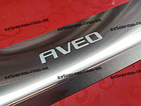 Накладка на задній бампер CHEVROLET AVEO II 4D *2006- Шевроле Авео 2 НЕРЖАВІЙКА із загином та логотипом