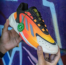 Чоловічі кросівки Adidas Ozelia осінь-весна демісезонні поморанчеві. Живе фото