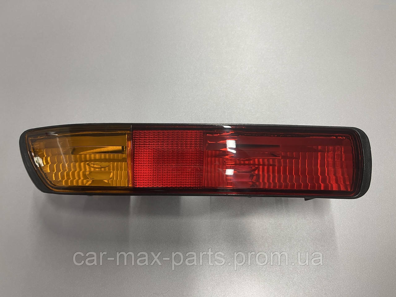 Ліхтар заднього бампера ЛОТОВИЙ Mitsubishi Pajero Wagon III 2000-2003 НОВИЙ АНАЛОГ ДОРЕСТЕЛЕНГ, фото 1