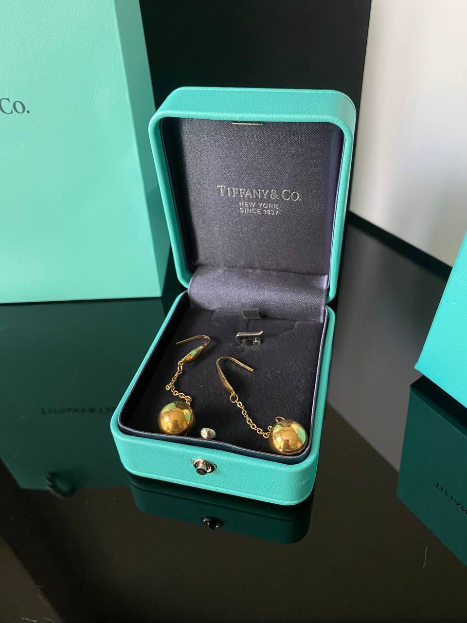 Сережки кульки на ланцюжку покриття золото 18 К/упаковані в мішечок Tiffany