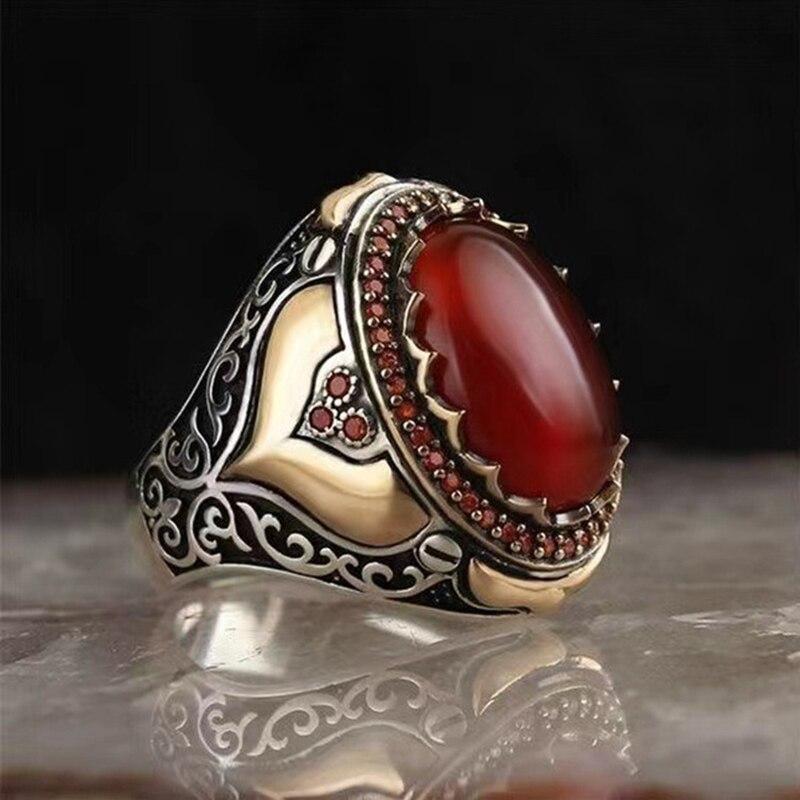 Унікальний чоловічий слов'янський перстень у вигляді великого шикарного червоного каменю зі срібла та золота, розмір 21