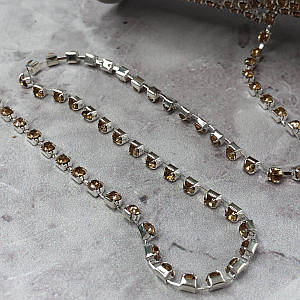 1м - Стразовий ланцюг SS 12 (3 мм) Бежевий кристал у сріблі