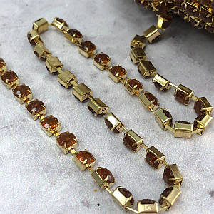 1м - Стразовий ланцюг SS 16 (4 мм) Коричневий кристал у золоті