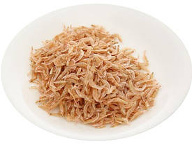 Сушені креветки, риба, ікра летких риб