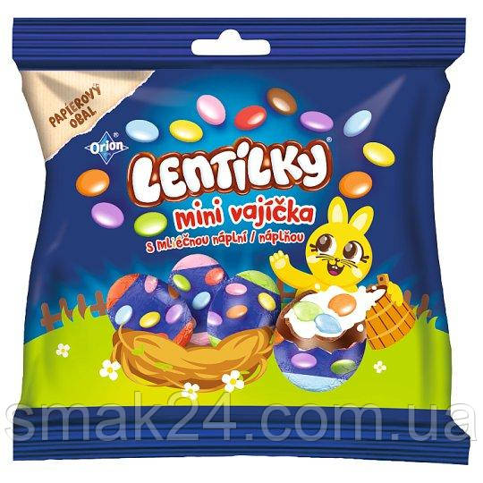 Шоколадні міні-яйця з молочним кремом і кольоровими драже Lentilky Orion 81 г Італія