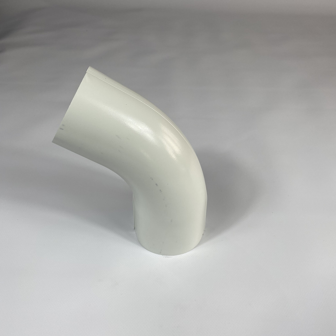 Коліно 67º Stream 90 мм RAL 9010 Білий