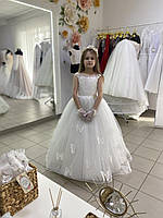 Бездоганна біла ошатна дитяча сукня до першого причастя з діадемою
