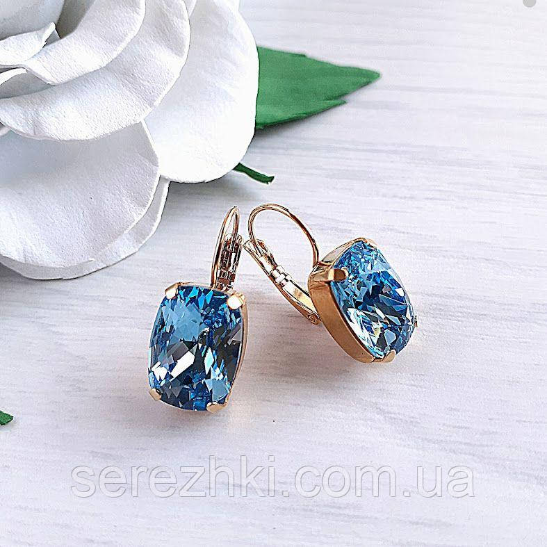 Позолочені сережки з кристалами Swarovski блакитного відтінку