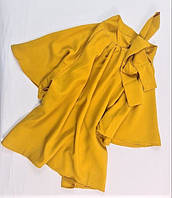 Женская горчичная блуза с коротким рукавом на завязке. Размер М.
