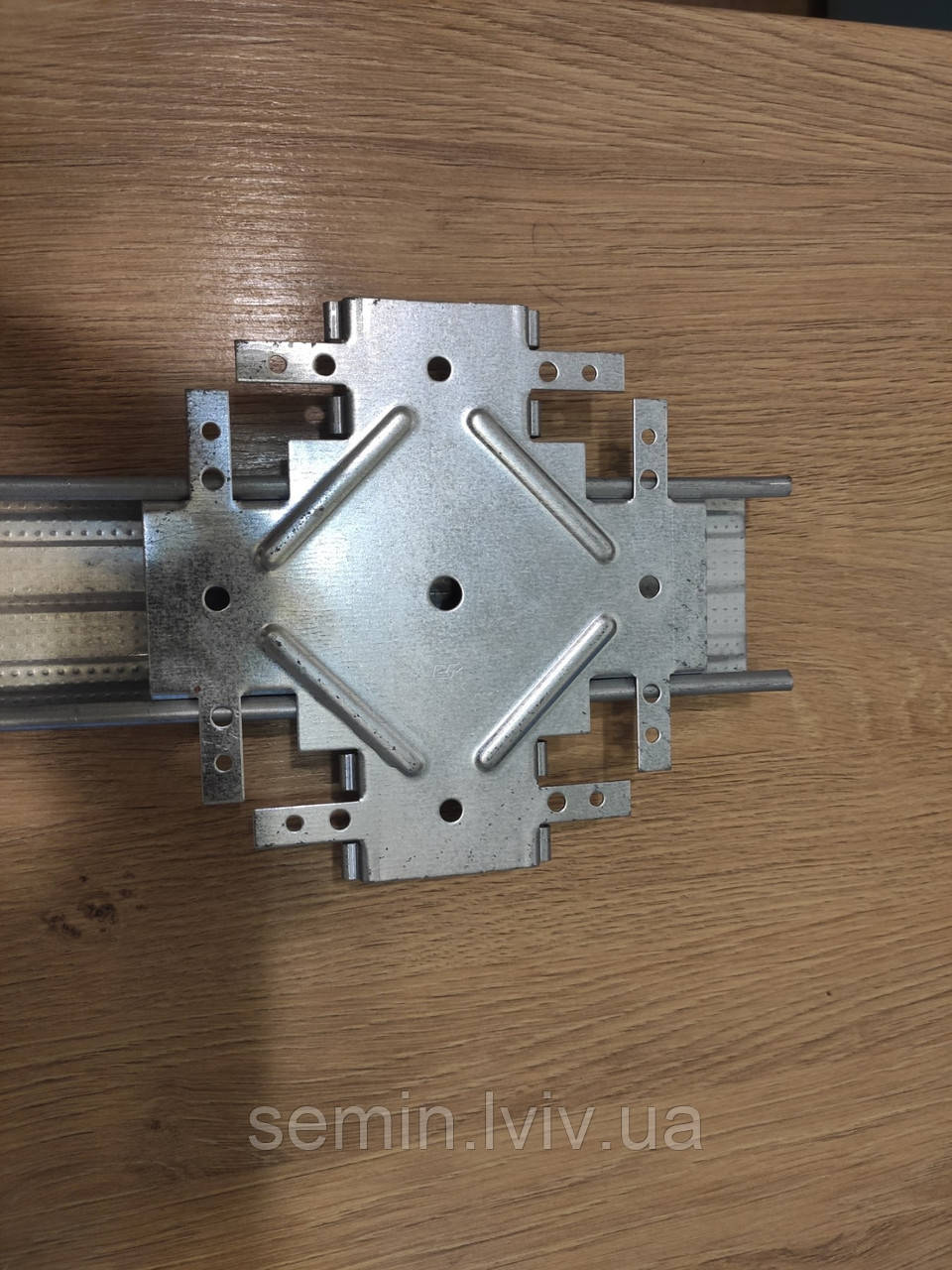 З'єднювач хрещатий однорівневий для профілю CD60/27 Knauf Niveauverbinder(краб) товщина 1мм Оригінал