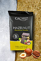 Шоколад черный с лесными орехами «Cachet» 300 г.