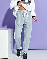 Серые трикотажные брюки с тесемками