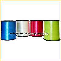 Стрічка пакувальна одноколірна в Бабіні 0,5 см х 300 м Червоний