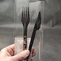 Набор одноразовых приборов LUX (Вилка + нож + влажная салфетка + зубочистка) в индивидуальной упаковке