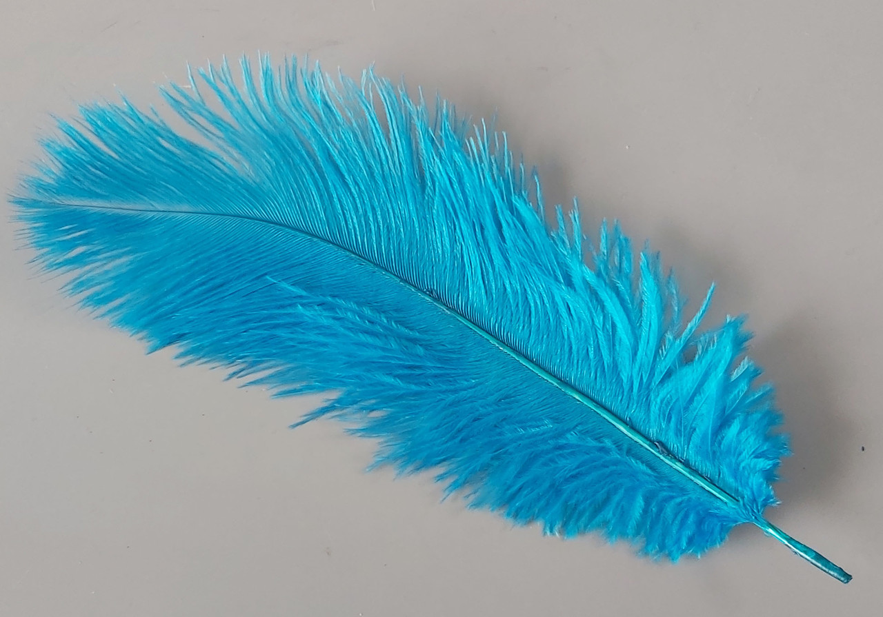 Перо страуса блакитне пастеле пухове 25-30 см