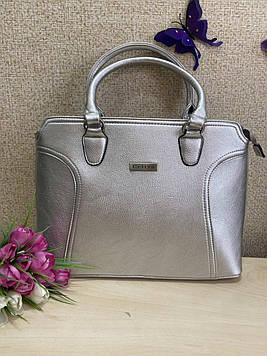 Срібляста жіноча сумочка