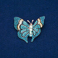 Брошка Метелик золотистий метал, блакитні і білі стрази і намистини 37х45мм + -