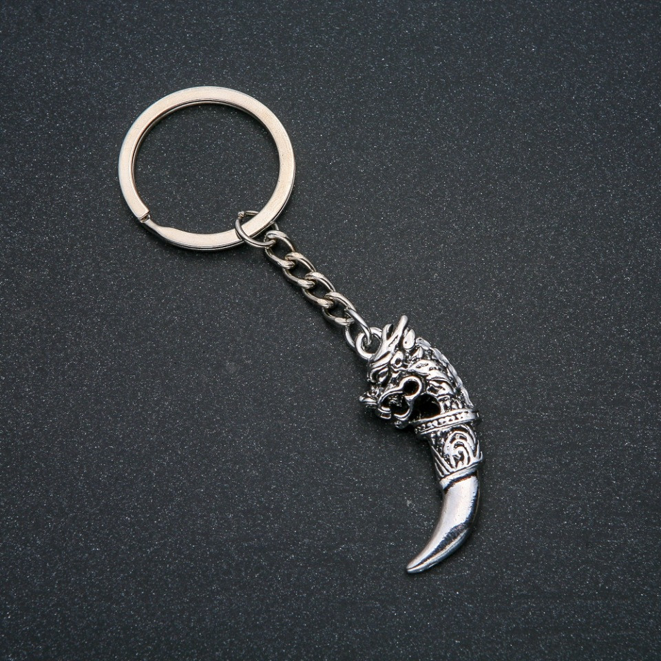 Брелок "Залізний ікло дракона" d-4х17мм L-9см + - сріблястий метал, фото 1