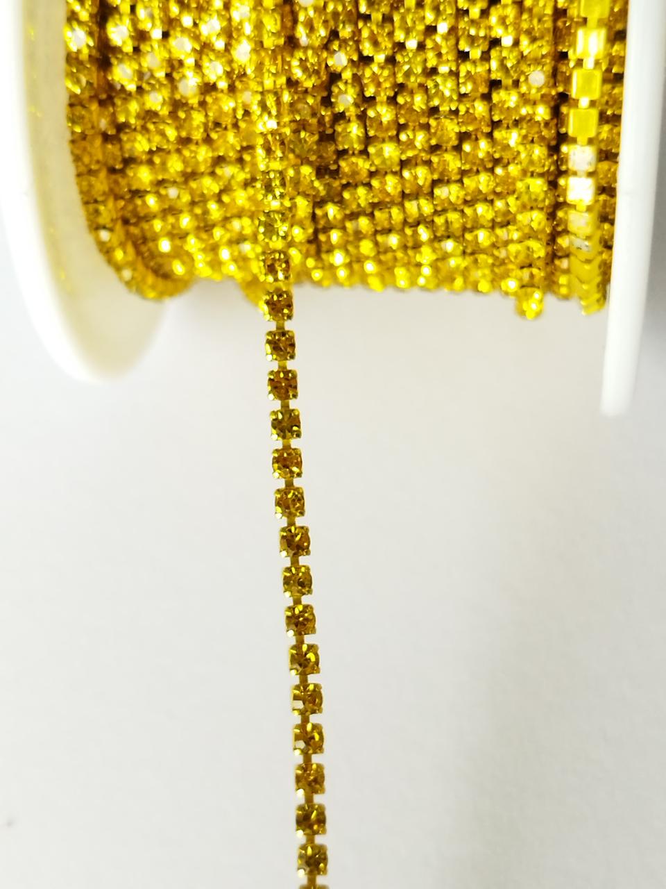 Стрічка стразова в цапах жовта 2 мм крок 1, фото 1