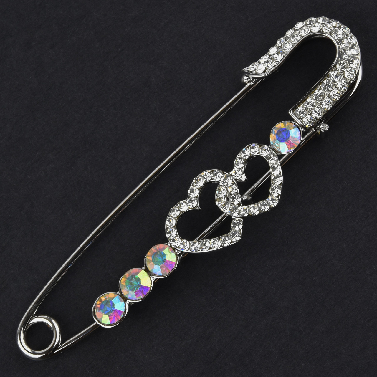 Брошка-бавка металева срібляста з кристалами серця розмір виробу 75 мм ювелірне виготовлення - фото 1 - id-p1804737033
