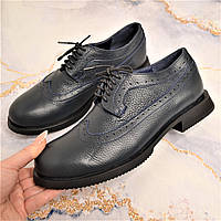 Шкіряні туфлі на низькому ходу зі шнурівкою