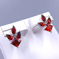 Сережки-гвоздики XР. Родій. Камені: бордовий циркон. Довжина: 15 мм. Ширина: 10 мм.