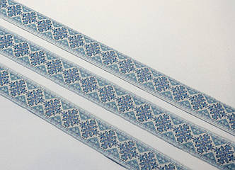 Тасьма стрічка 25 мм із українським орнаментом зх блакитним і білим візерунком