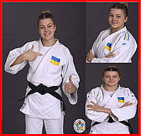 Професійне кімоно для дзюдо ADIDAS Champion II з ліцензією IJF біле з синьо-жовтими смугами