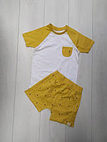 Костюм для мальчика футболка и шорты желто-белый George 62-68см