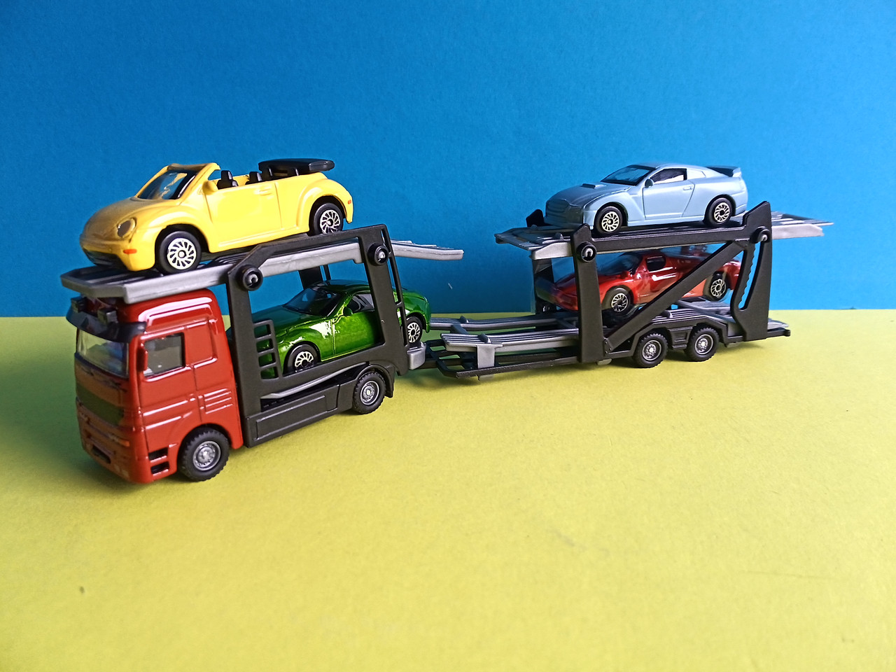 Іграшка Трейлер автовоз із 4 легковими автомобілями TECHNOPARK